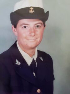 Lindsey Lovett, a young Naval sailor in uniform