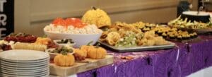 A table filled with Halloween-themed food