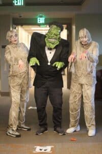 Team members dressed as Frankenstein and mummies